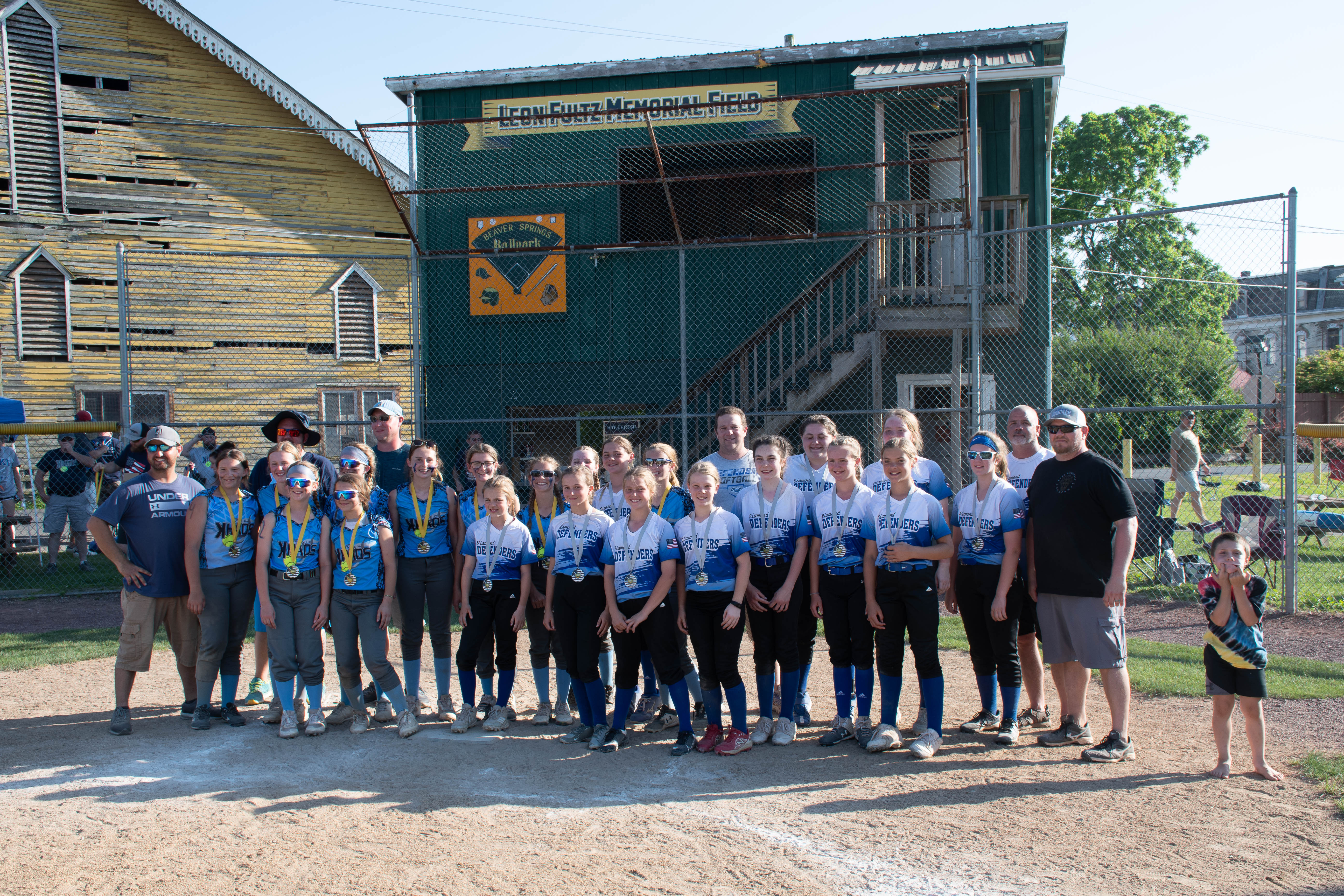 First and second place teams with their coaches.