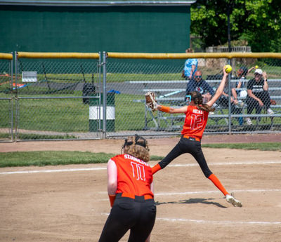 Pitcher mid windup.