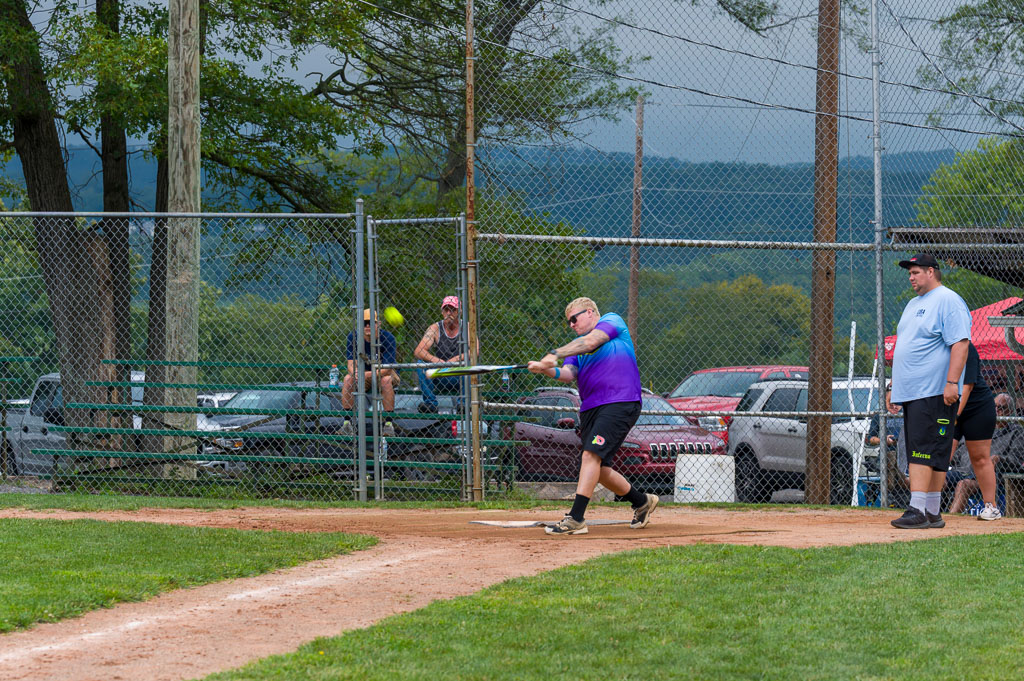 Batter just after hitting the ball.