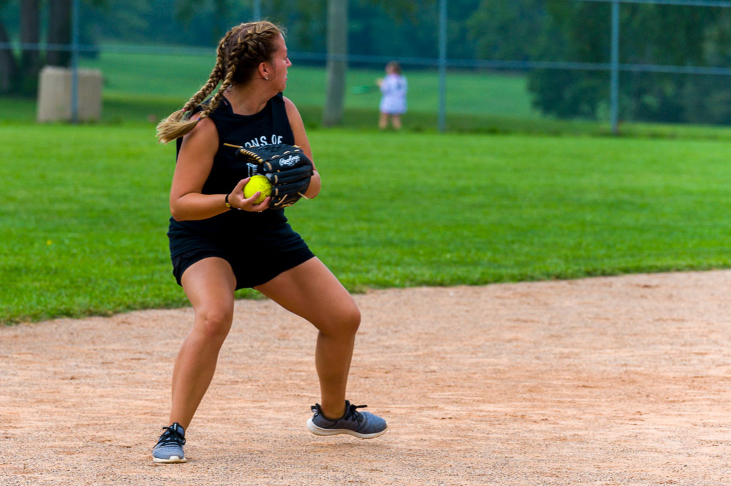 Shortstop prepares to throw ball to second baseman.