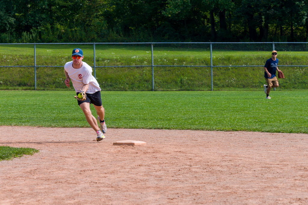 Shortstop catches ball just to side of second base.