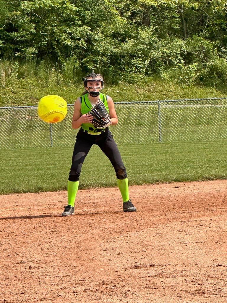 Ball heading towards third baseman.