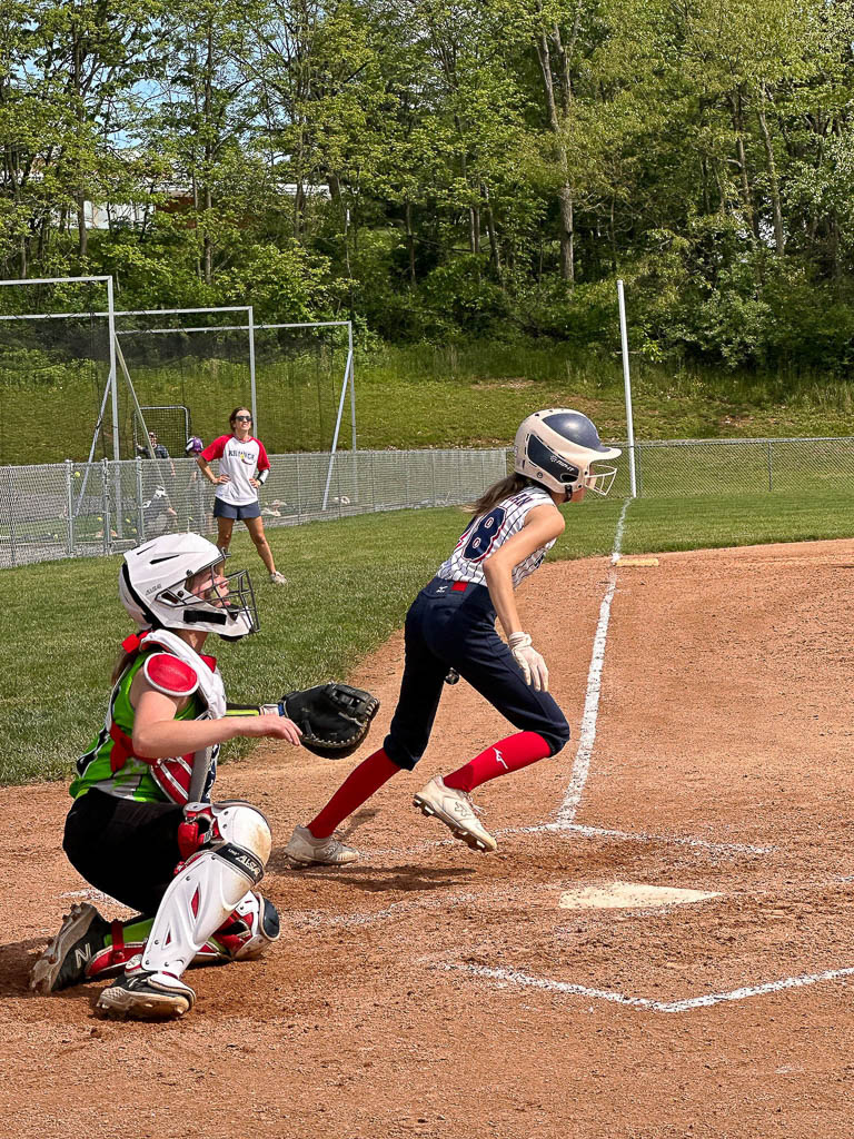 Batter just starting run towards first base.