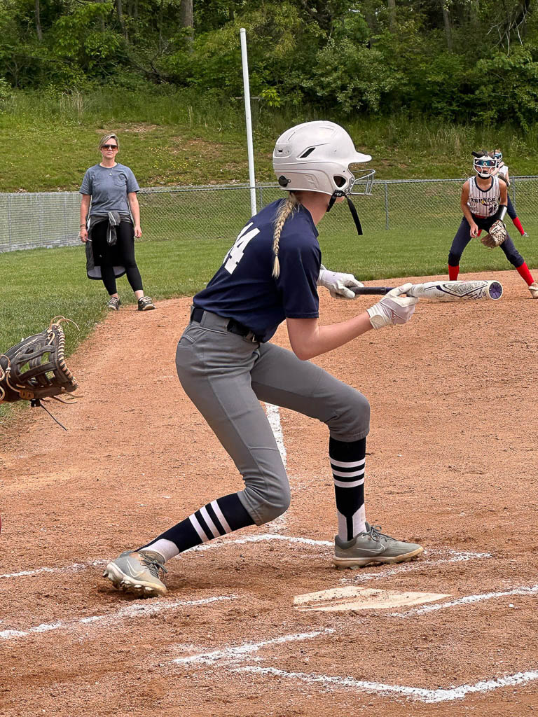 Batter about to bunt the ball.