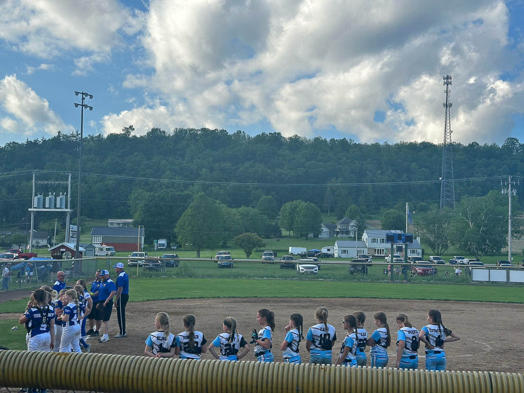 Two teams are waiting for game to start.